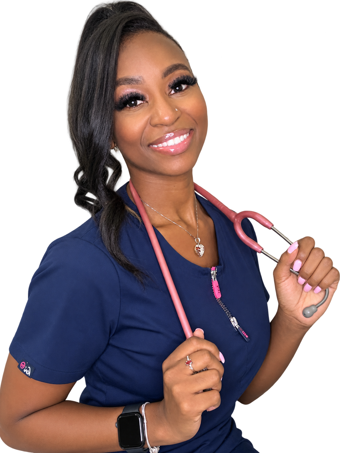 Ashley, founder of Bridge to Bedside, in navy nursing scrubs